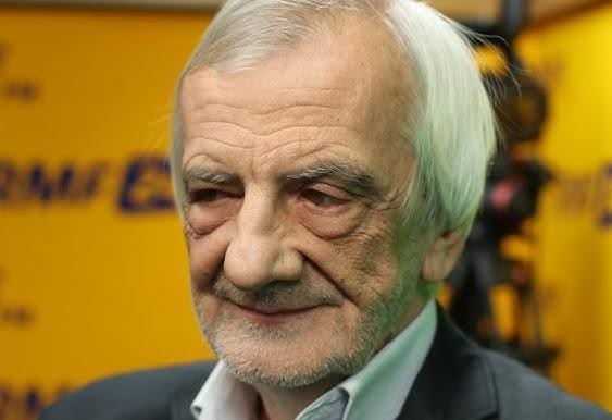 Grafika przedstawiająca złożony życiorys Ryszarda Terleckiego, łącząca elementy akademickie (książki, uniwersytet), polityczne (Sejm, polska flaga) oraz nawiązania do młodości (motywy hippisowskie, symbolika muzyczna), w stonowanych barwach.